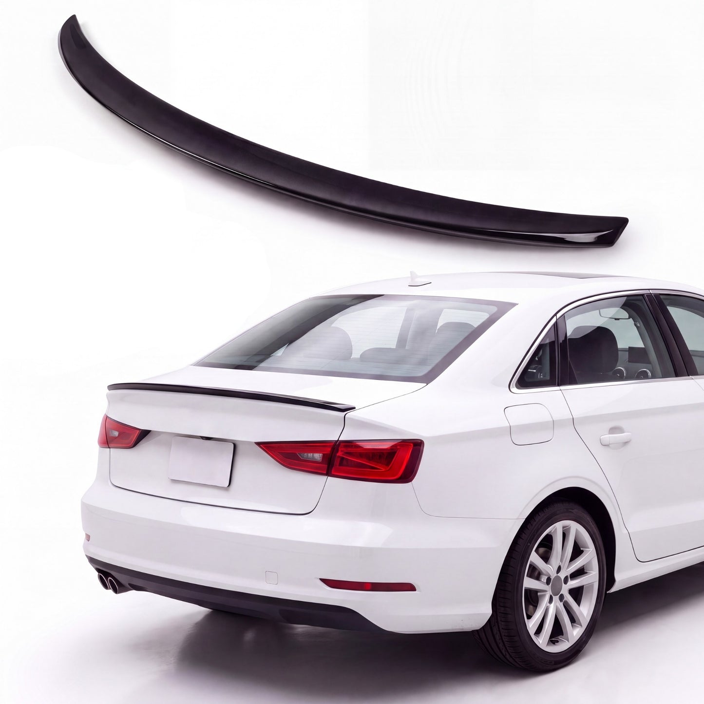 Gloss black trunk lip spoiler on white Audi A3 8V sedan rear three-quarter view