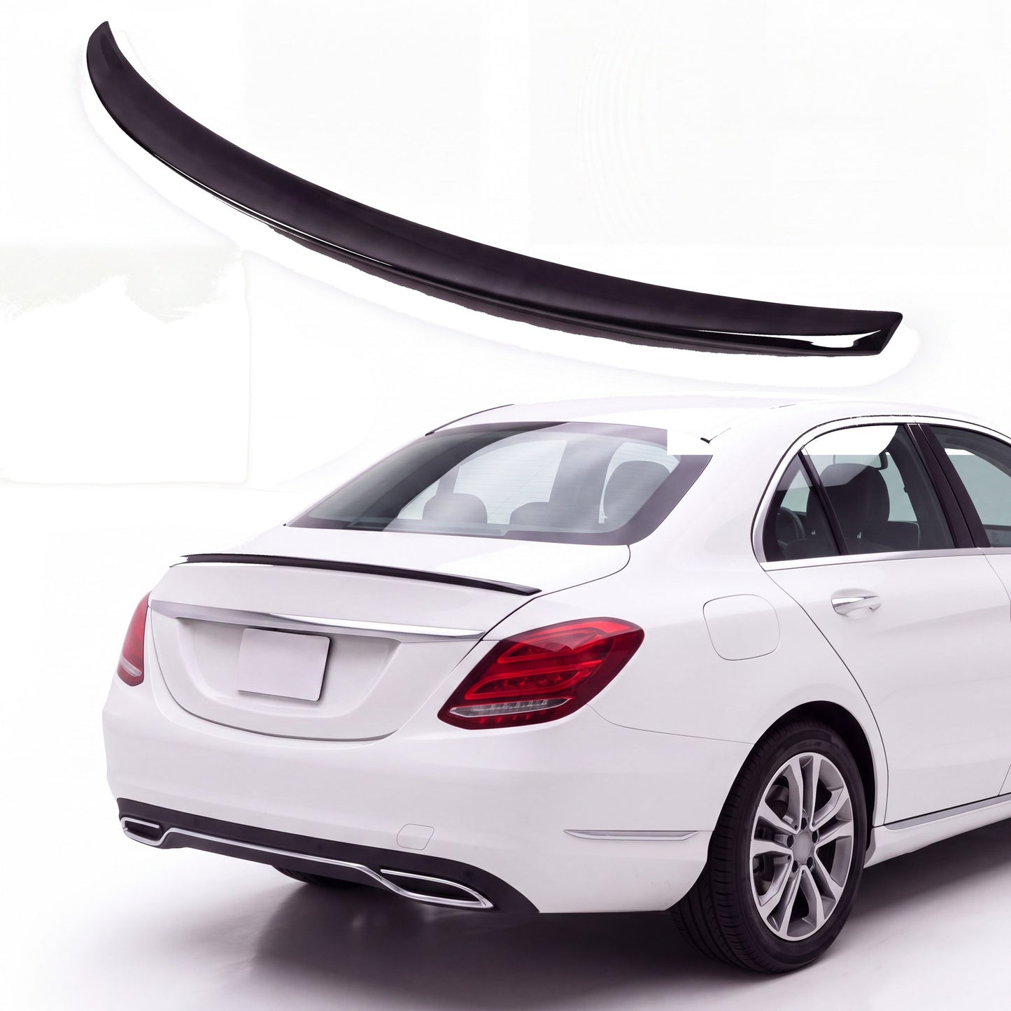 Gloss black trunk lip spoiler on white Mercedes-Benz C-Class W205 sedan rear three-quarter view
