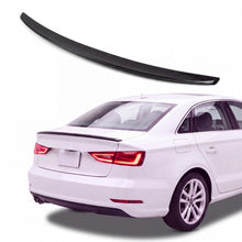 Gloss black trunk lip spoiler on white Audi A3 8V sedan rear three-quarter studio product photo