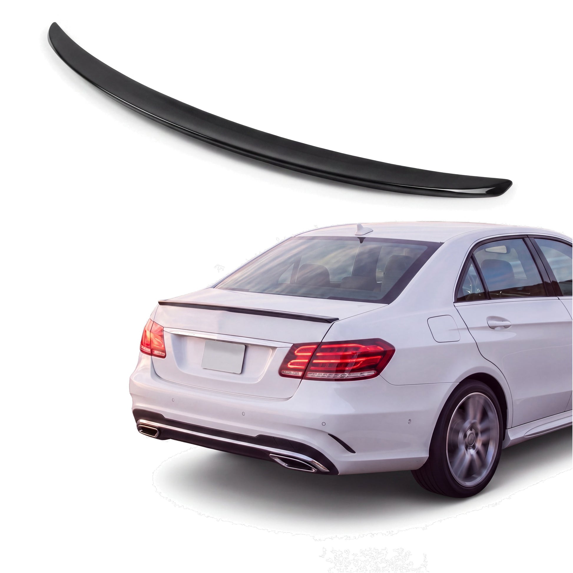Gloss black trunk lip spoiler on white Mercedes-Benz E-Class W212 sedan rear three-quarter studio product photo