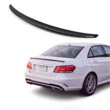 Gloss black trunk lip spoiler on white Mercedes-Benz E-Class W212 sedan rear three-quarter studio product photo